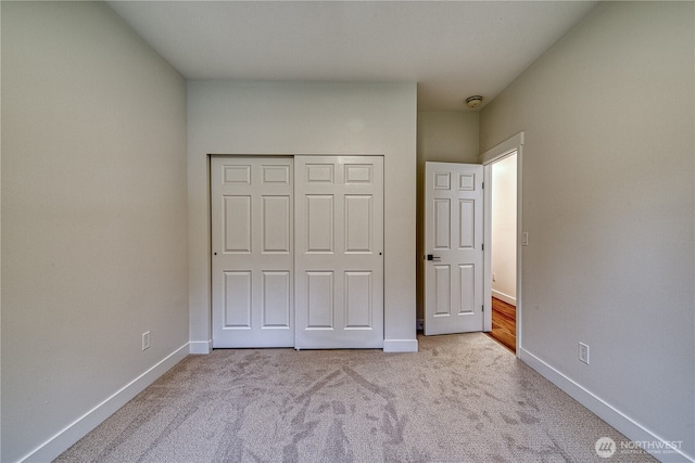 2822 200th Ave SW, Lakebay, WA 98349 - unfurnished bedroom with carpet, baseboards, and a closet