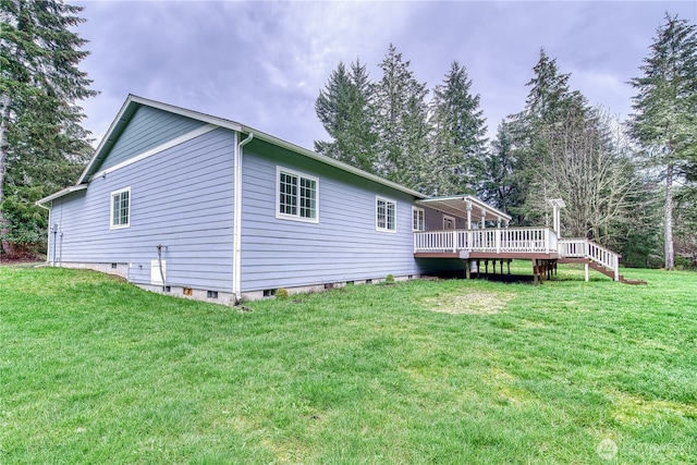 2822 200th Ave SW, Lakebay, WA 98349 - view of home's exterior featuring a wooden deck and a yard