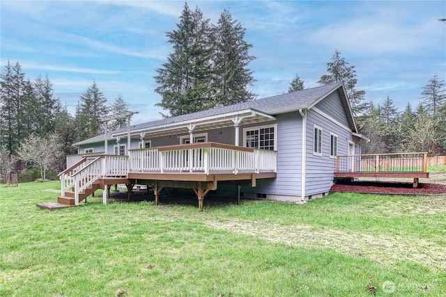 2822 200th Ave SW, Lakebay, WA 98349 - back of house featuring a wooden deck and a yard