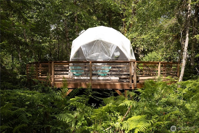 exterior space with a view of trees