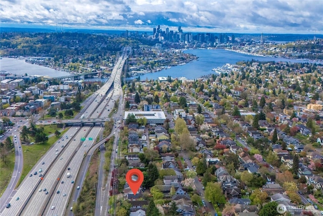 bird's eye view with a water view and a city view