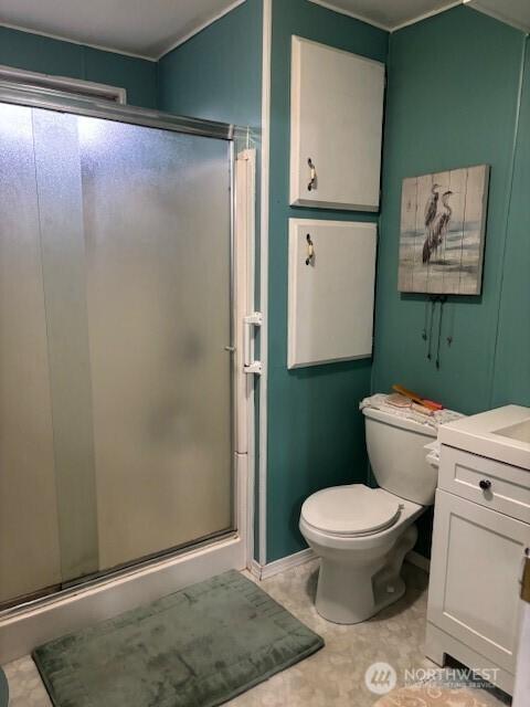 6210 105th Ave Court E Unit 67, Puyallup, WA 98372 - full bath with vanity, toilet, baseboards, and a shower stall