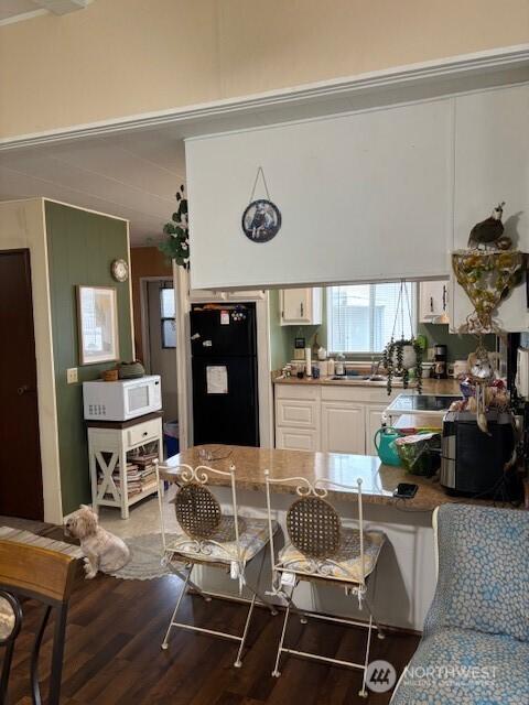 6210 105th Ave Court E Unit 67, Puyallup, WA 98372 - living area featuring wood finished floors