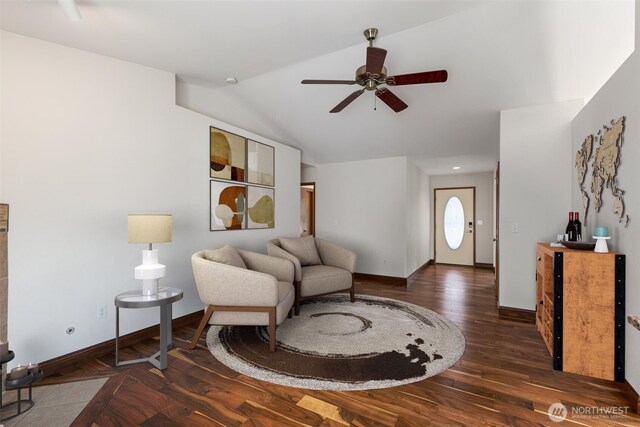 living room featuring a ceiling fan, wood finished floors, lofted ceiling, and baseboards
