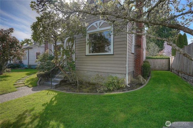 3018 N 13th St, Tacoma, WA 98406 - view of side of home featuring fence and a lawn