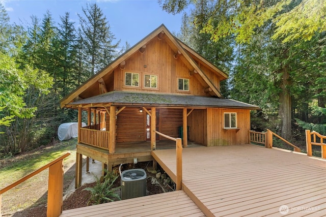 wooden deck featuring central AC
