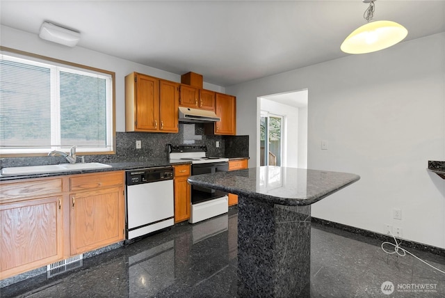 8703 232nd Street Ct E, Graham, WA 98338 - kitchen featuring white dishwasher, granite finish floor, under cabinet range hood, a sink, and range with electric stovetop