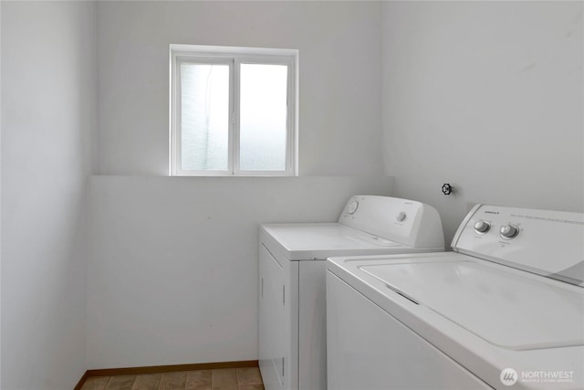 8703 232nd Street Ct E, Graham, WA 98338 - clothes washing area featuring laundry area, washer and clothes dryer, and baseboards