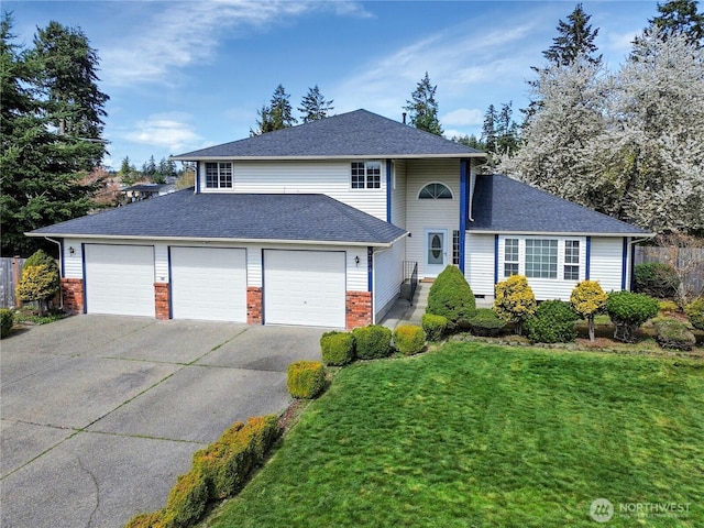 8703 232nd Street Ct E, Graham, WA 98338 - view of front facade with fence, brick siding, driveway, a garage, and a front yard