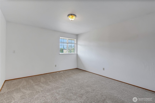 8703 232nd Street Ct E, Graham, WA 98338 - empty room featuring baseboards and carpet floors