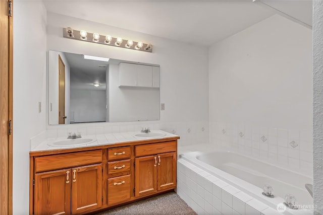 8703 232nd Street Ct E, Graham, WA 98338 - bathroom with double vanity, a bath, and a sink