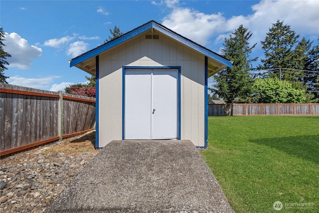 8703 232nd Street Ct E, Graham, WA 98338 - view of shed with a fenced backyard