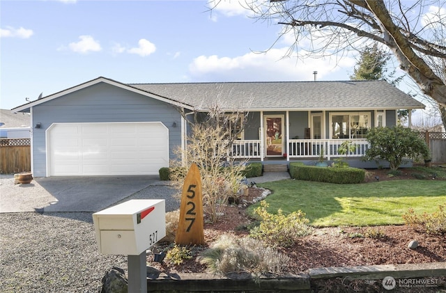 527 Island View Dr, Camano Island, WA 98282 - ranch-style house with concrete driveway, a porch, an attached garage, and roof with shingles