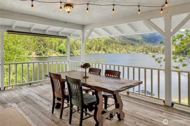 3058 Camp 2 Rd, Sedro Woolley, WA 98284 - wooden deck with a wooded view, a water view, and outdoor dining area