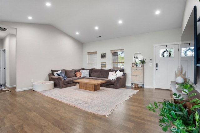 living room with visible vents, vaulted ceiling, recessed lighting, wood finished floors, and baseboards