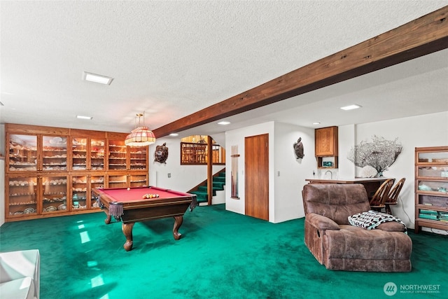 rec room featuring carpet floors, a textured ceiling, and pool table