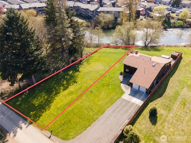 aerial view with a water view and a residential view