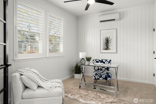 office space with carpet flooring, baseboards, a wall unit AC, and ceiling fan