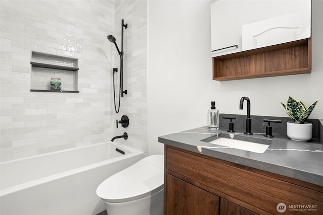 full bath featuring vanity,  shower combination, and toilet