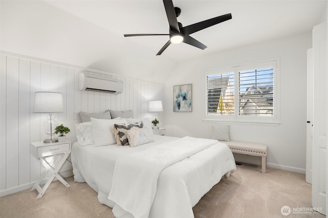 carpeted bedroom with a wall mounted air conditioner, baseboards, a ceiling fan, and lofted ceiling