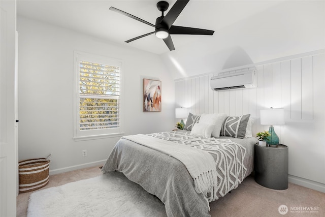 carpeted bedroom featuring ceiling fan, baseboards, vaulted ceiling, and a wall unit AC