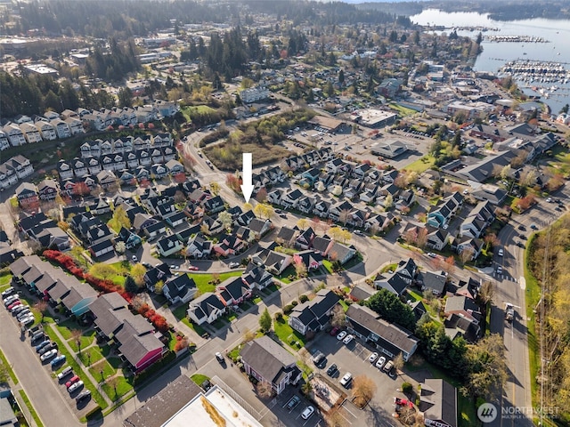 aerial view with a water view and a residential view