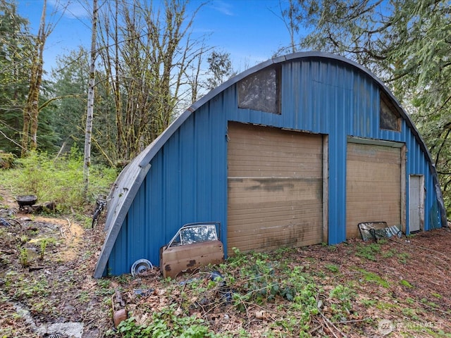 view of outbuilding featuring an outdoor structure
