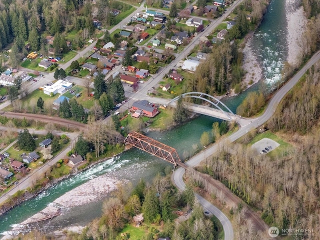 bird's eye view with a water view
