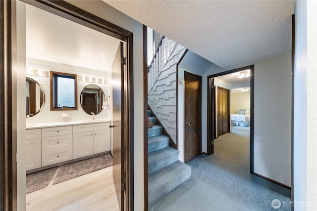 478 SW Judson Dr, Oak Harbor, WA 98277 - stairs featuring a textured ceiling