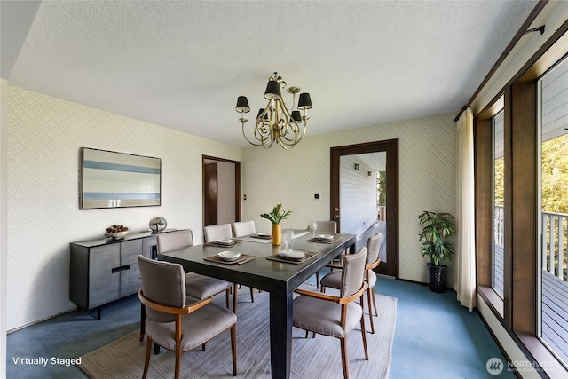 478 SW Judson Dr, Oak Harbor, WA 98277 - dining space with a textured ceiling, an inviting chandelier, and wallpapered walls