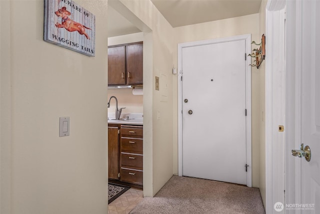 hall featuring a sink
