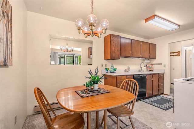 dining area with a chandelier and baseboard heating