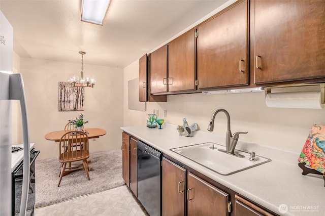 kitchen featuring a notable chandelier, light countertops, white electric stove, dishwasher, and a sink