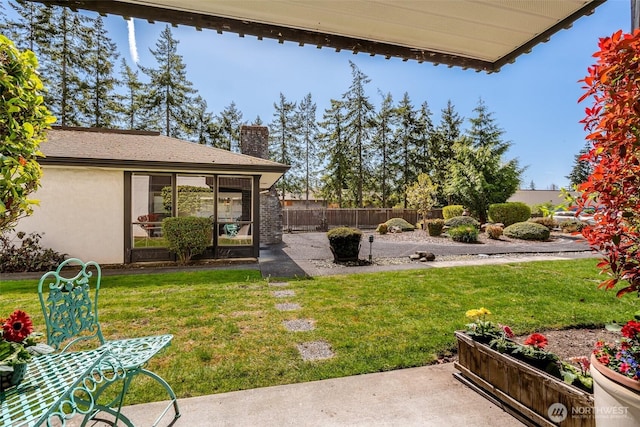 view of yard with a patio area and fence