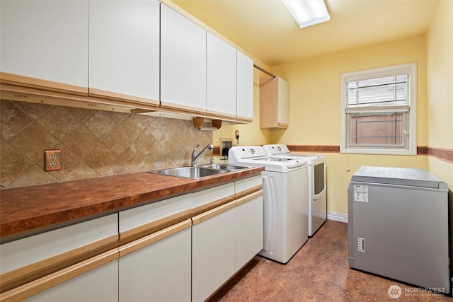 13923 SE 79th Dr, Newcastle, WA 98059 - washroom featuring cabinet space, washer and dryer, and a sink