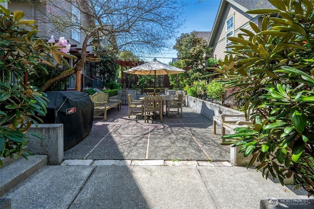 view of patio featuring outdoor dining space