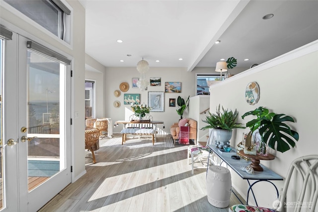 interior space with wood finished floors and recessed lighting