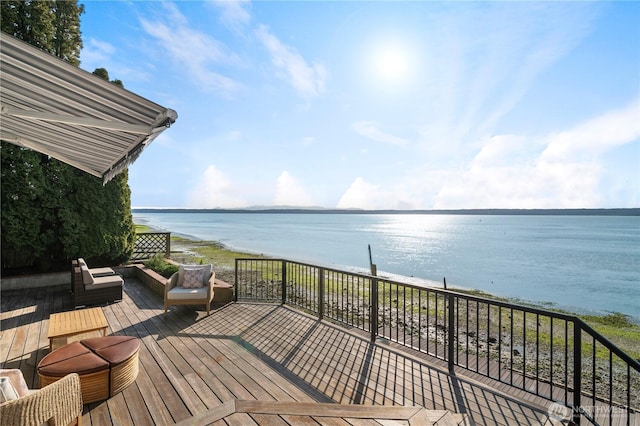 wooden terrace with a water view