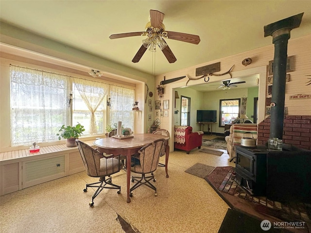 107 Martin Rd, Glenoma, WA 98336 - dining area featuring a wood stove and ceiling fan