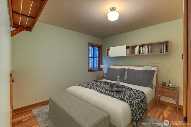 104 Barn Owl Trl, Orcas Island, WA 98245 - bedroom featuring light wood-style floors and baseboards