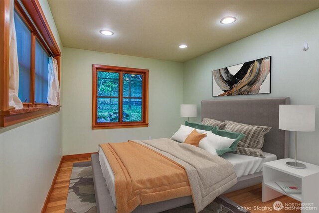 104 Barn Owl Trl, Orcas Island, WA 98245 - bedroom with recessed lighting, wood finished floors, and baseboards