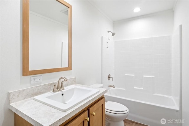 643 NW Hickory St, Mcminnville, OR 97128 - full bathroom with crown molding, toilet, vanity, and shower / washtub combination