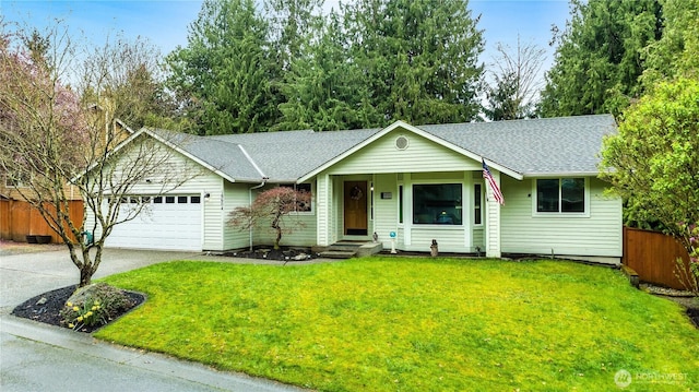 single story home featuring roof with shingles, a front yard, fence, an attached garage, and concrete driveway
