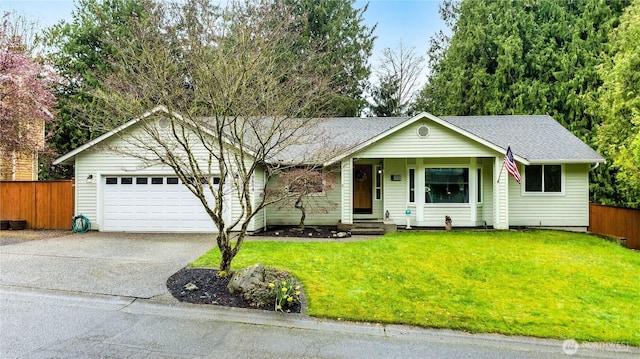 ranch-style home featuring a garage, a shingled roof, a front yard, fence, and driveway