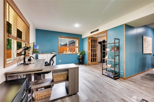office with baseboards and wood finished floors