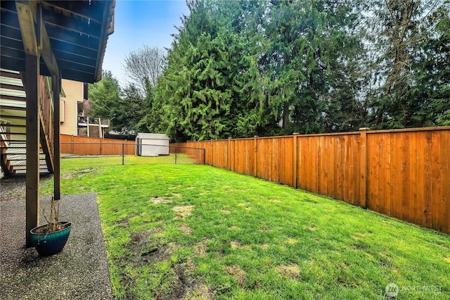 view of yard featuring a fenced backyard