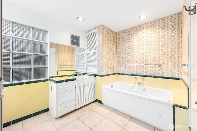 full bathroom with a bath, wallpapered walls, tile patterned flooring, and vanity
