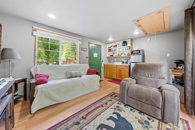 112 Mountain View Dr N, Ashford, WA 98304 - living area featuring recessed lighting, light wood-style floors, and attic access