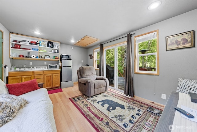 112 Mountain View Dr N, Ashford, WA 98304 - living area featuring recessed lighting, a toaster, light wood-style floors, and attic access