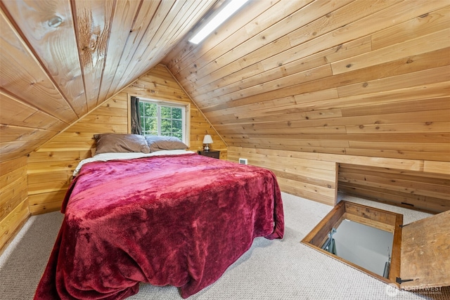 112 Mountain View Dr N, Ashford, WA 98304 - carpeted bedroom featuring wood walls, vaulted ceiling, and wooden ceiling